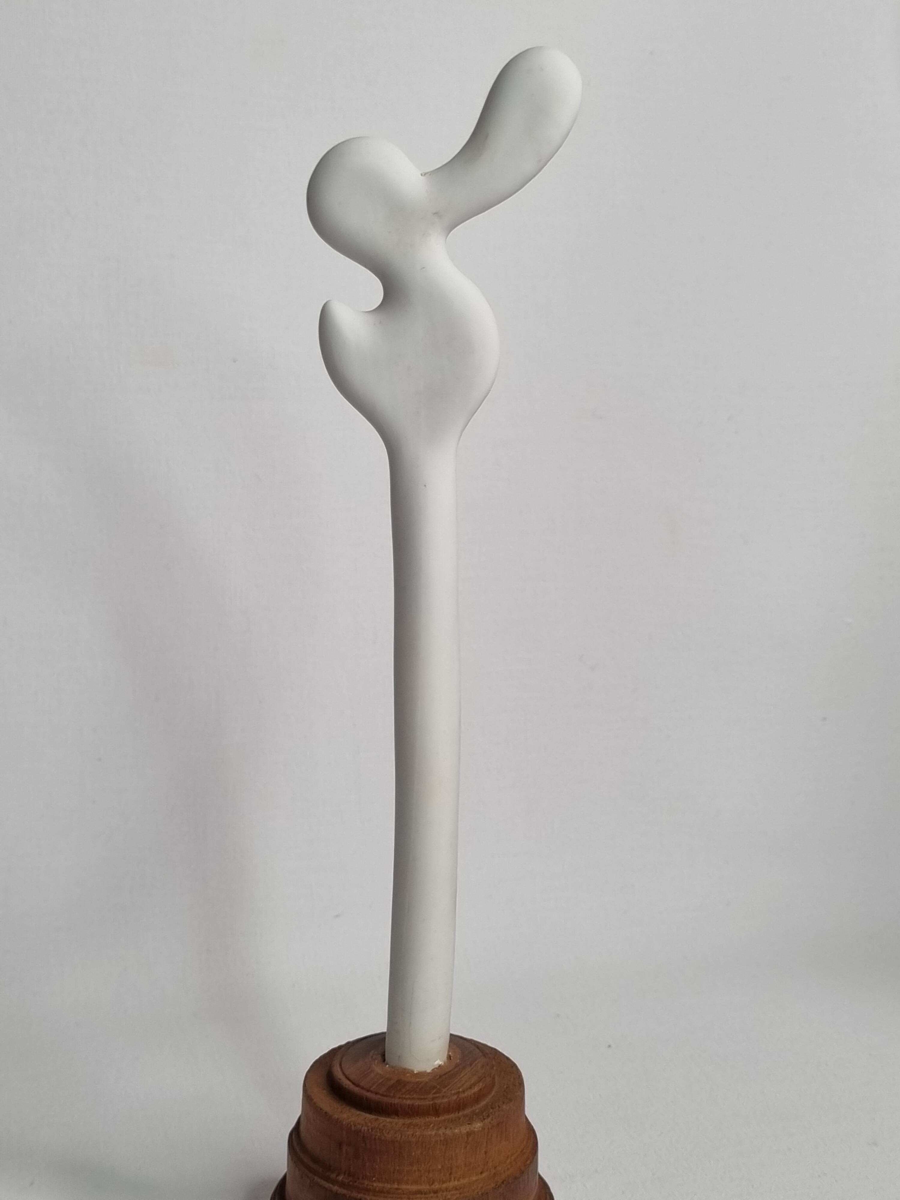 Biomorphic-inspired sculpture, on an industrial wooden base, 28 cm