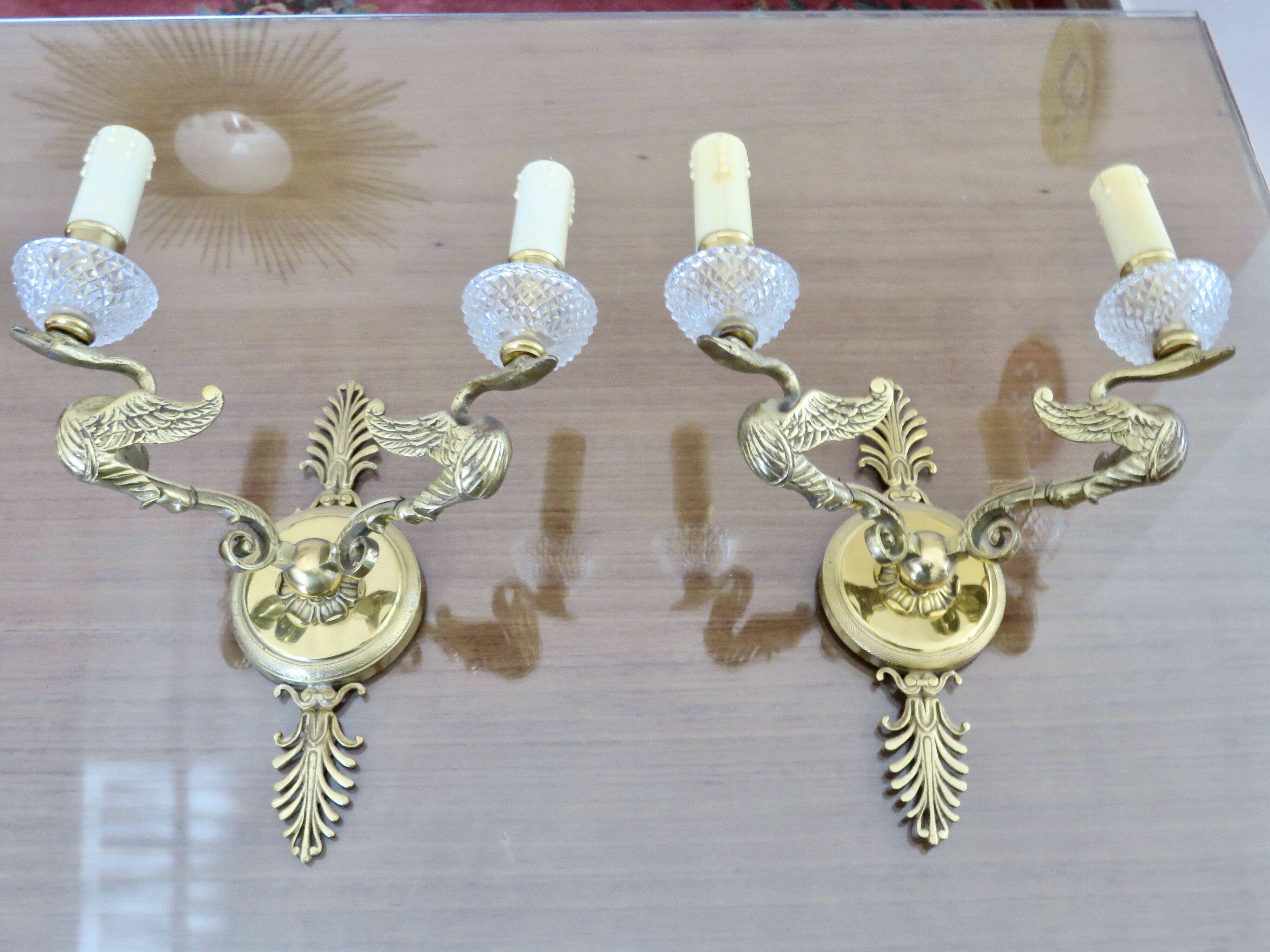 Pair of Lucien Gau "swan" wall lights in gilded bronze with bright gold and crystal