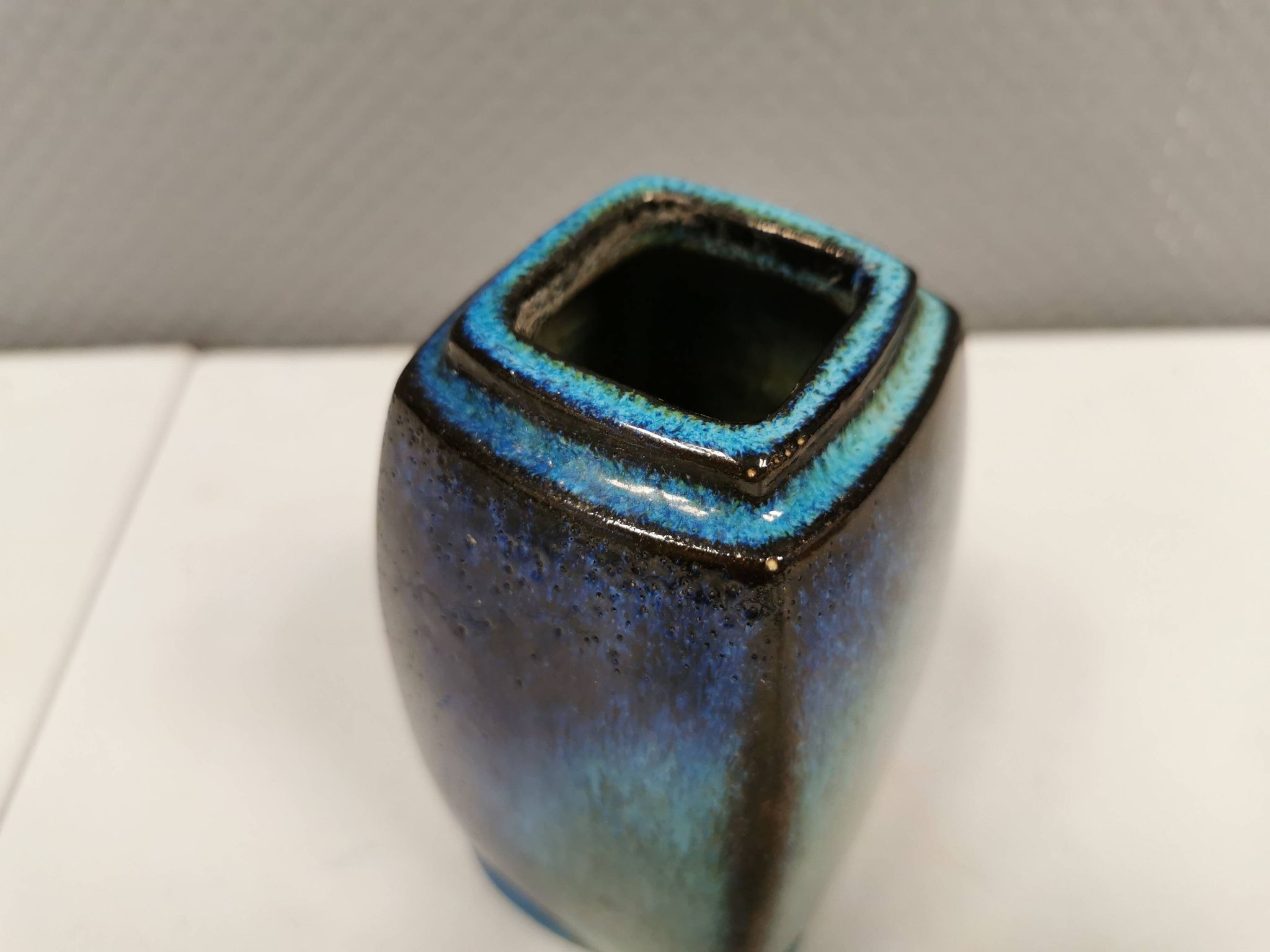 Vase in several shades of blue, from Danish Stogo art pottery. Estimated 1970-1980s