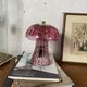 Vintage table lamp in fuchsia pink glass.