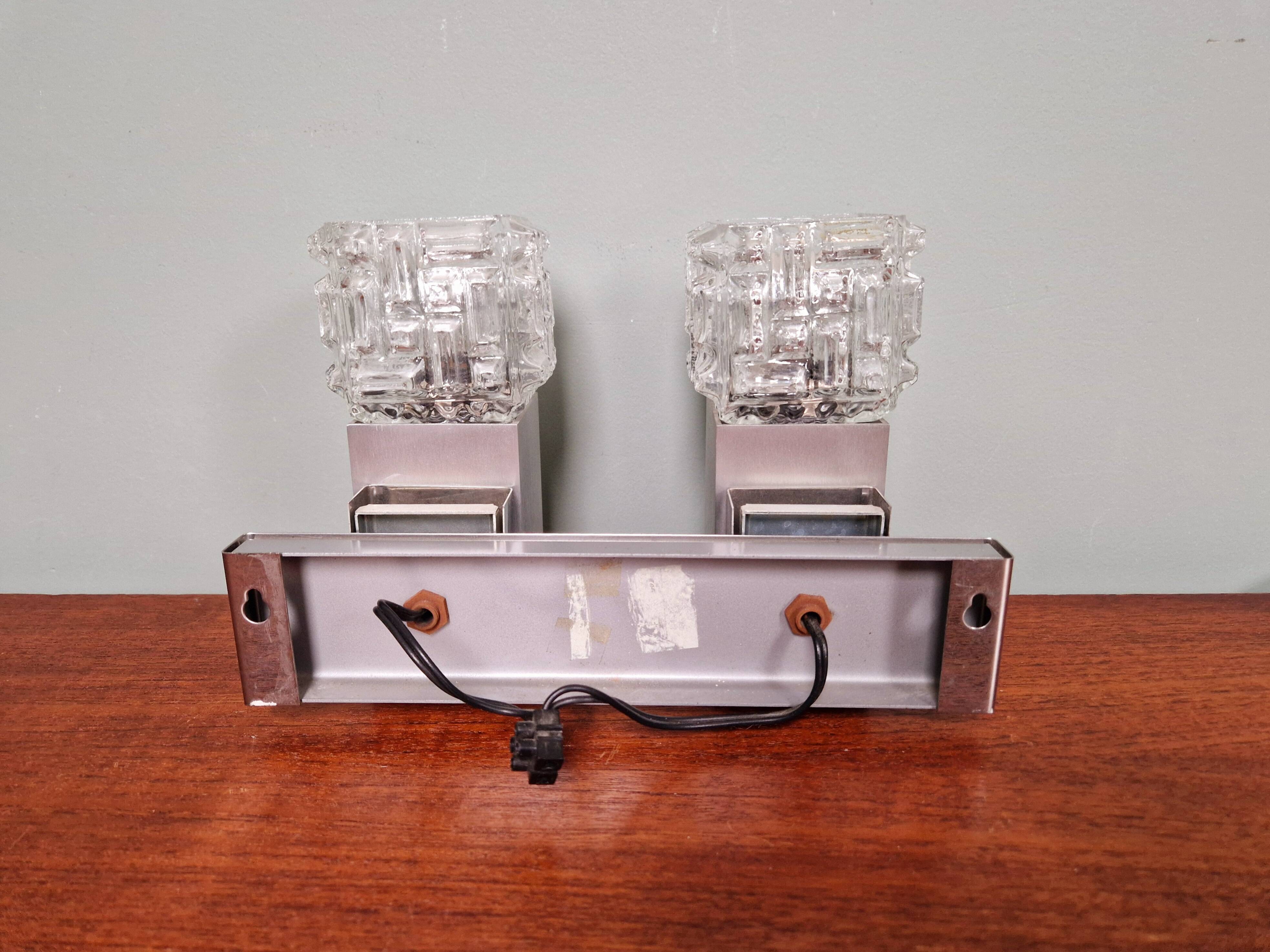 Pair of brushed aluminum and crystal wall lights, 1970s