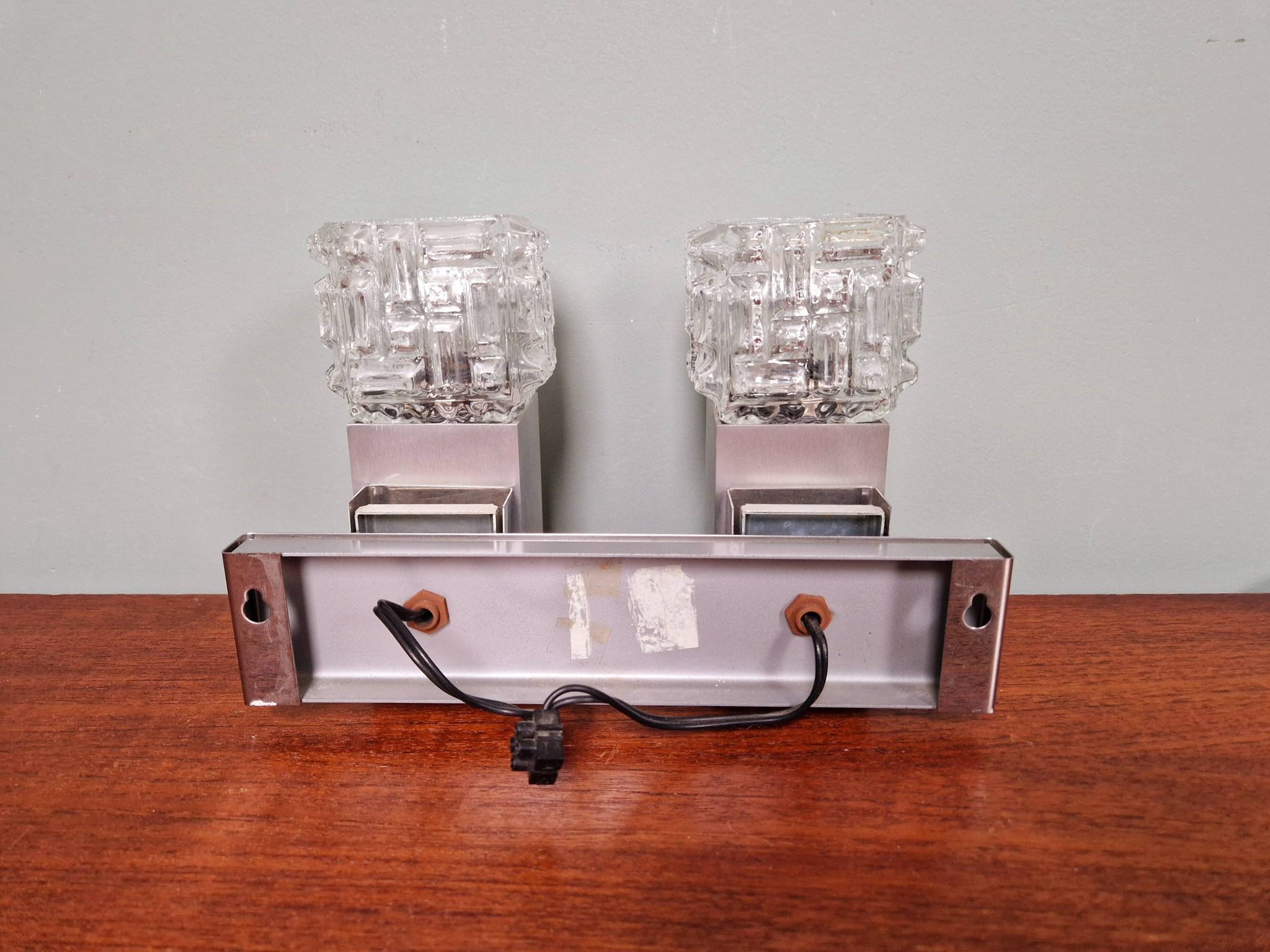 Pair of brushed aluminum and crystal wall lights, 1970s