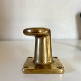 Pair of golden cast iron hooks