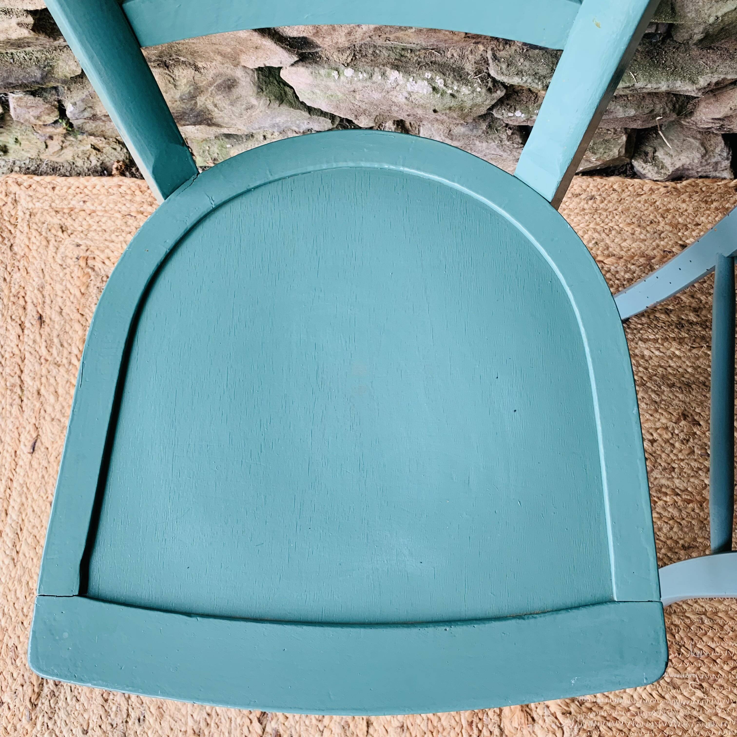 Set of four mismatched bistro chairs