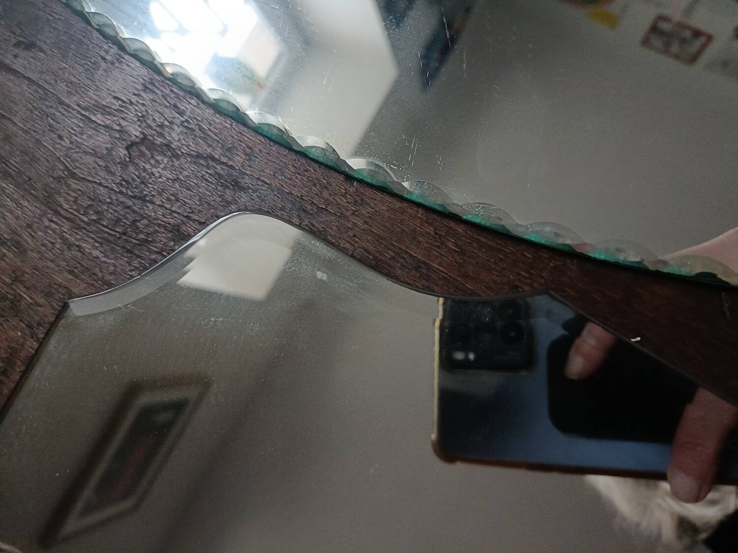 Three beveled mirrors