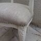 Louis XV style armchair in patinated beige, upholstered in beige fabric.