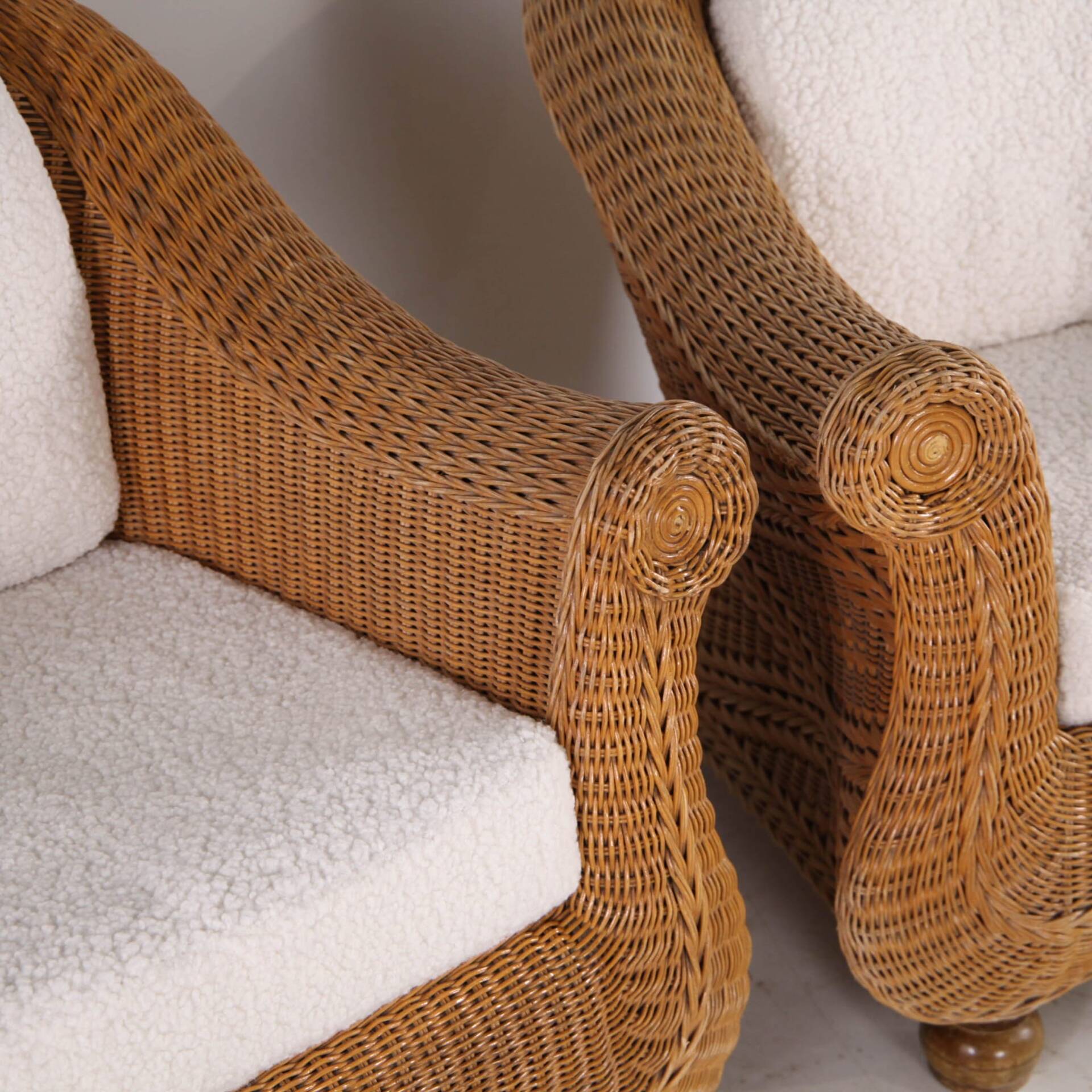 Pair of woven wicker armchairs