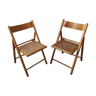Pair of folding chairs in cannage