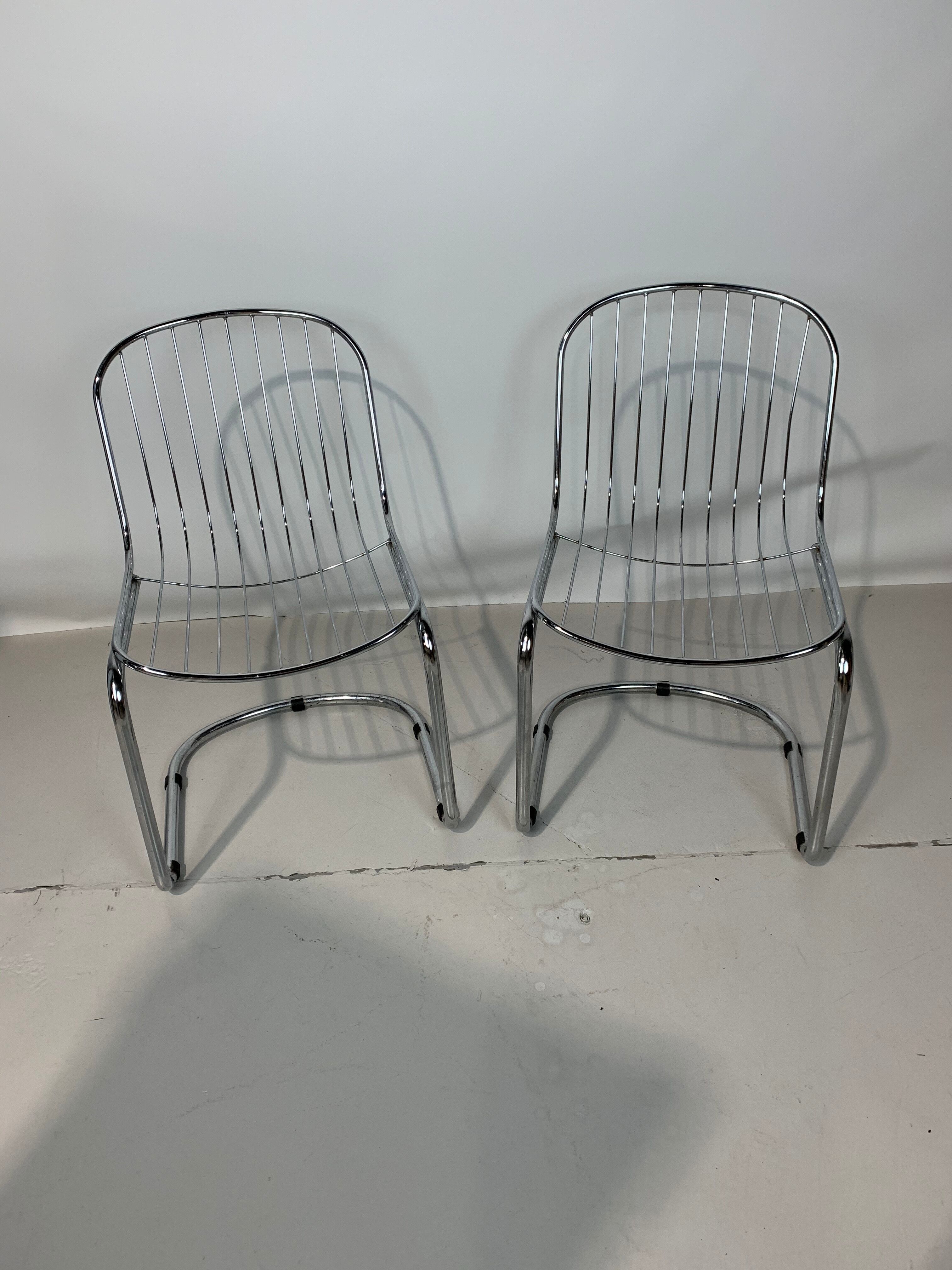 Pair of chairs by Gastone Rinaldi