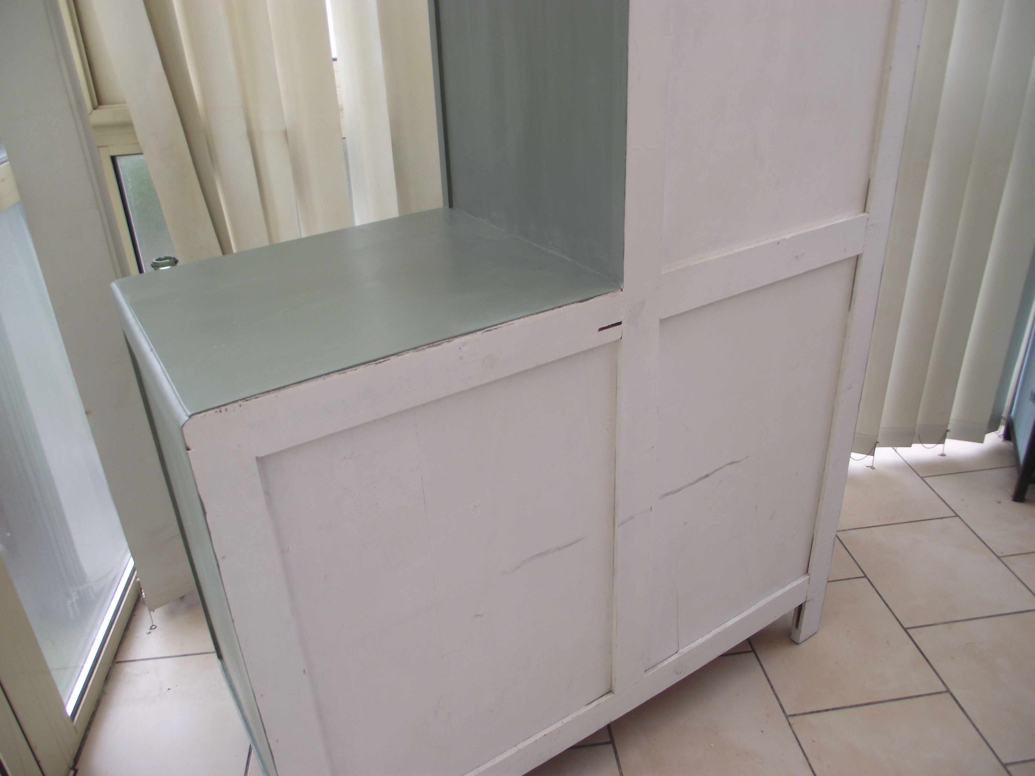 Asymmetrical cabinet from the 50s