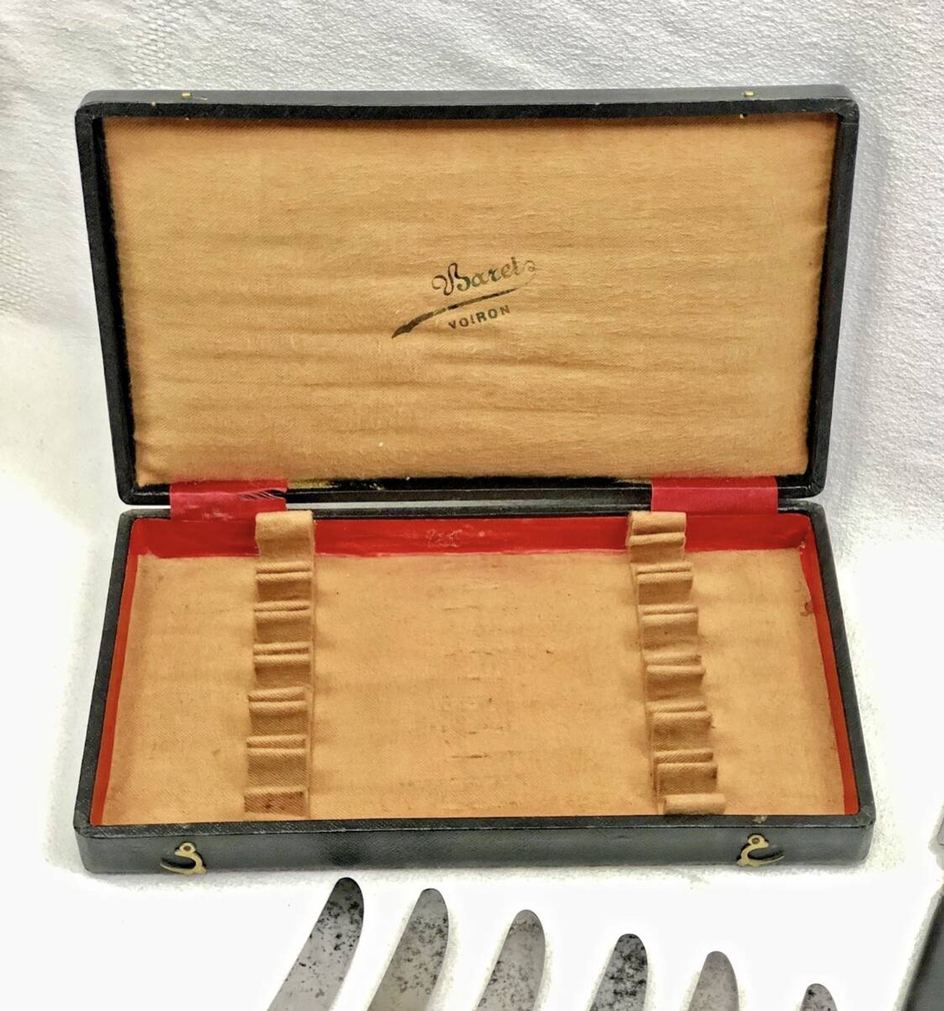 12 antique large table knives with ebony handles from the Napoleonic III period.