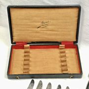 12 antique large table knives with ebony handles from the Napoleonic III period.