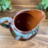 Old ceramic jug with glazed finish – flame decoration