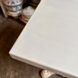 Bistro table in beige cast iron and ecru wood