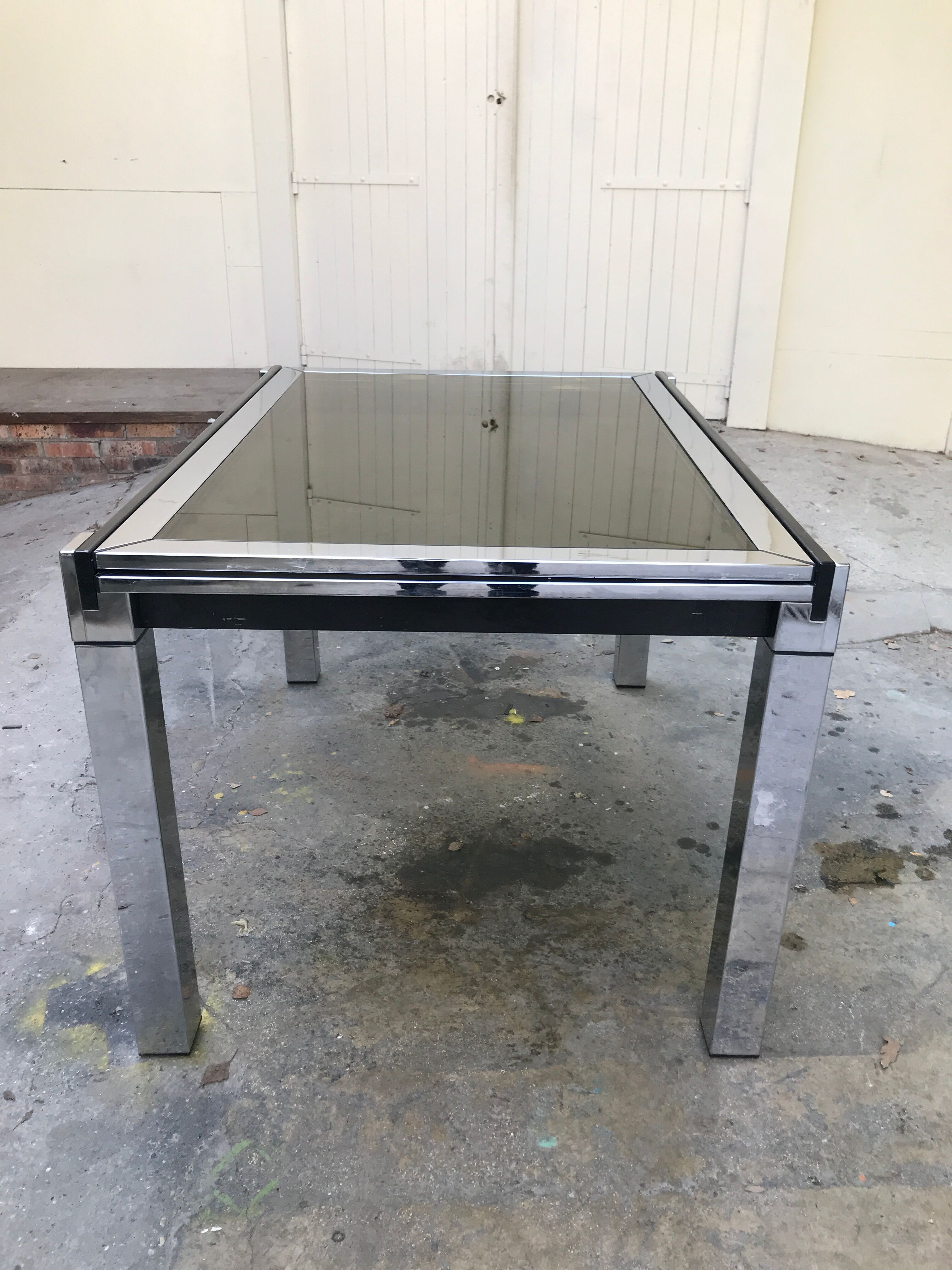 Chrome dining table and glass system