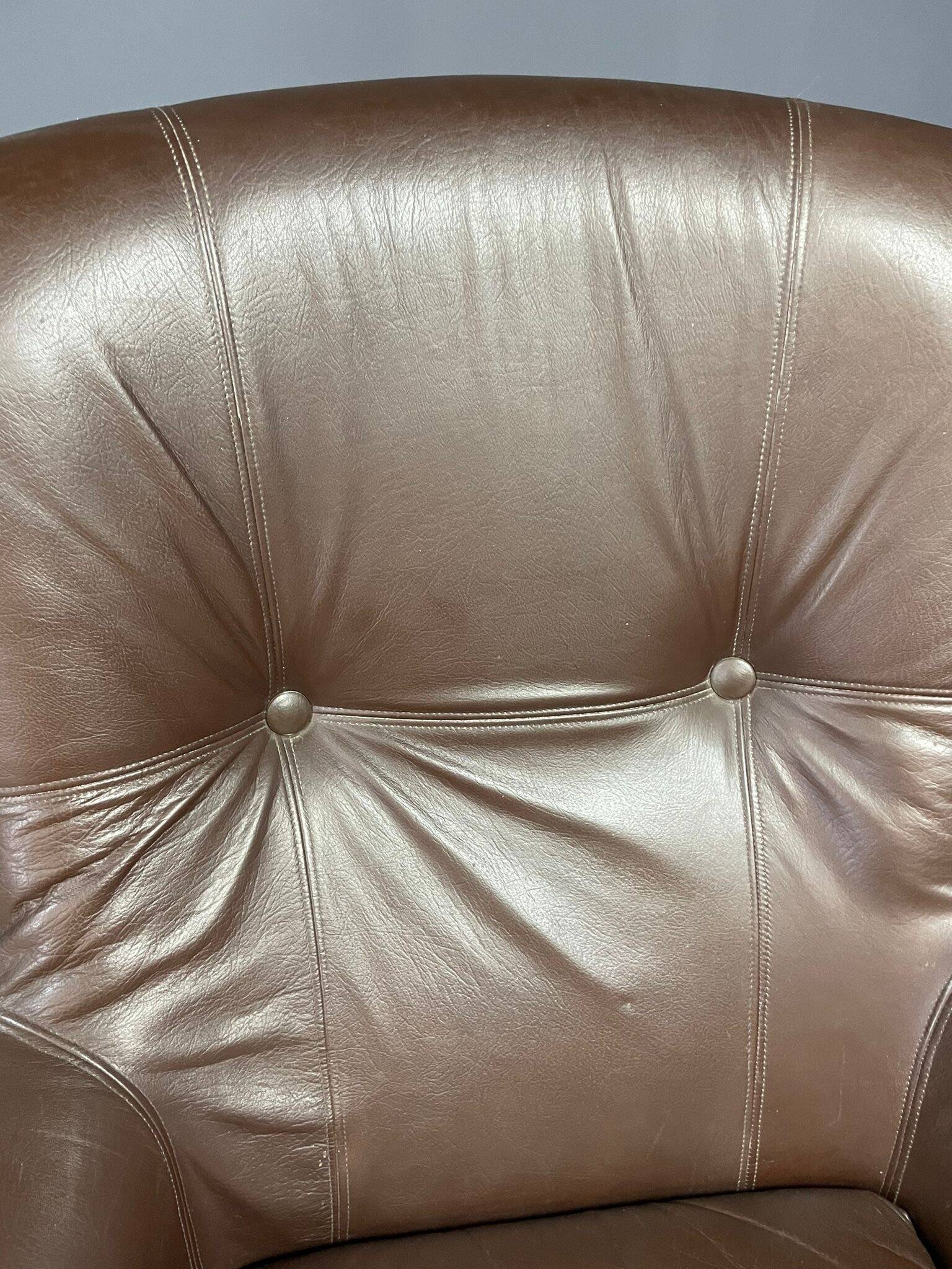 Pair of leather swivel armchairs by PEEM, Finland, 1970s