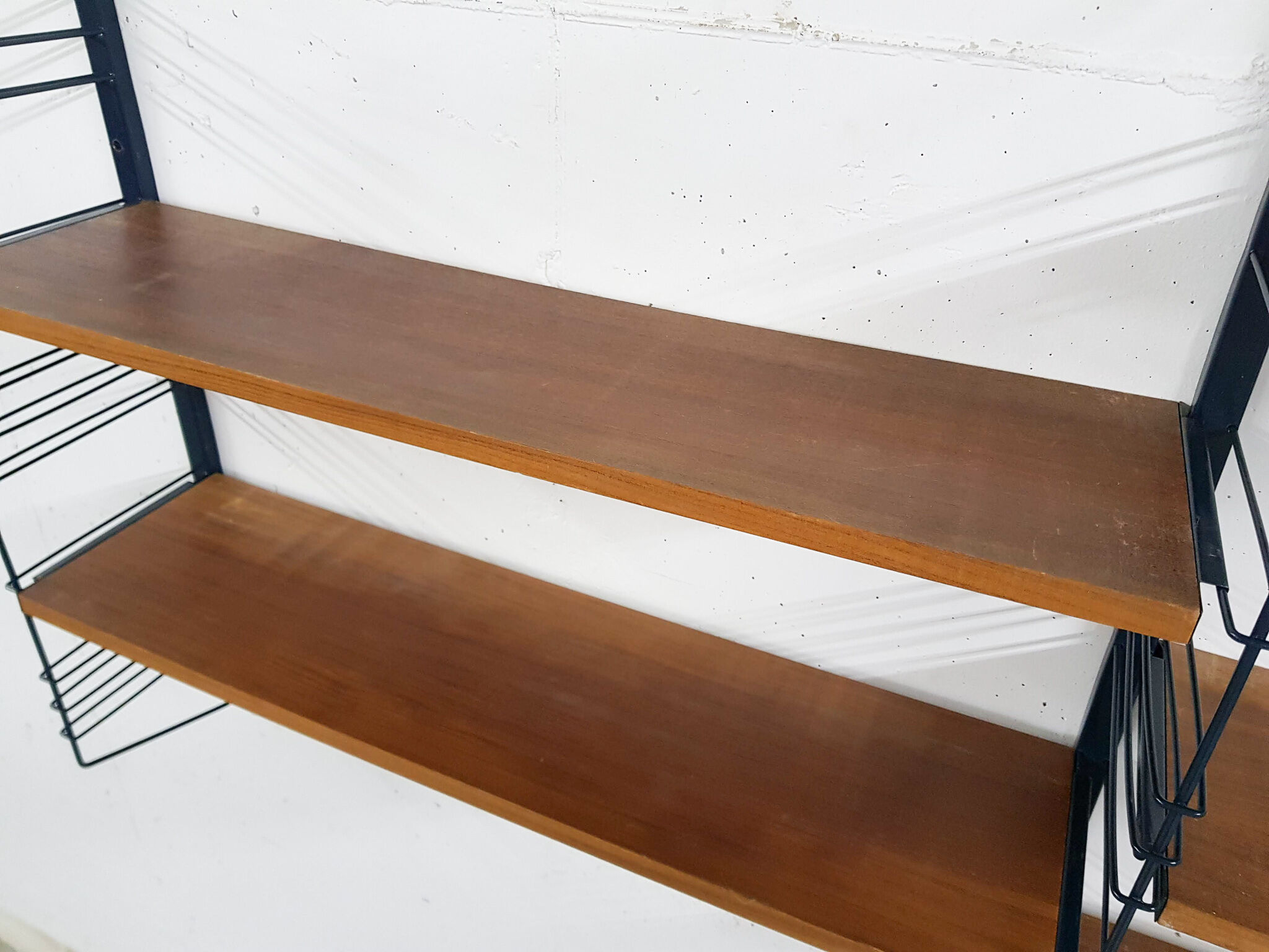 Mid-century book shelves in the style of Tomado