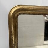 Louis Philippe mirror in wood and gilded stucco, 19th century