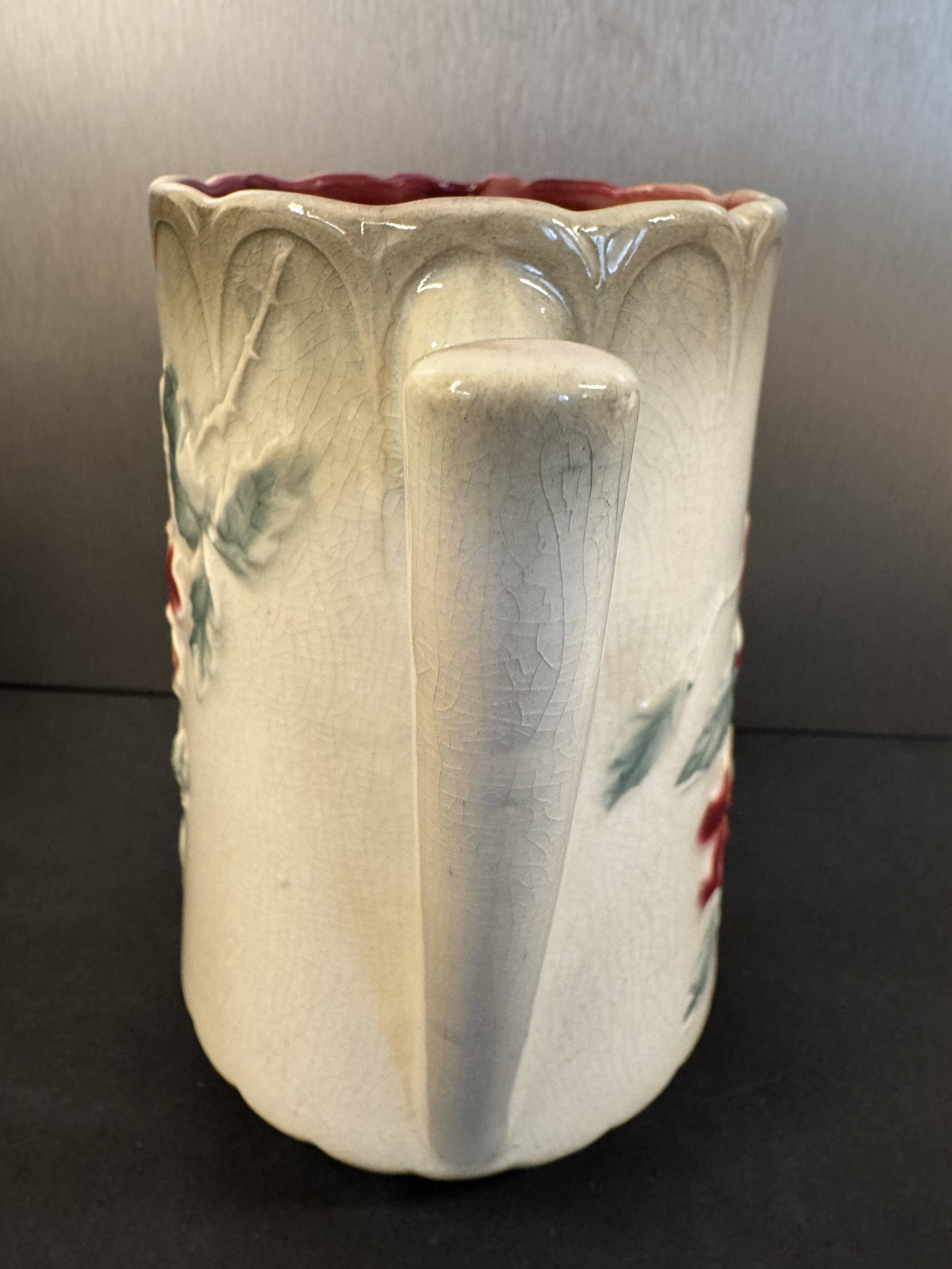 Antique pitcher in slipware with floral decoration – red and cream floral design