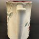 Antique pitcher in slipware with floral decoration – red and cream floral design