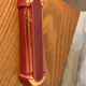 6 knife holders in burgundy glazed ceramic with art deco gold edging