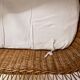 Rattan cradle on wheels