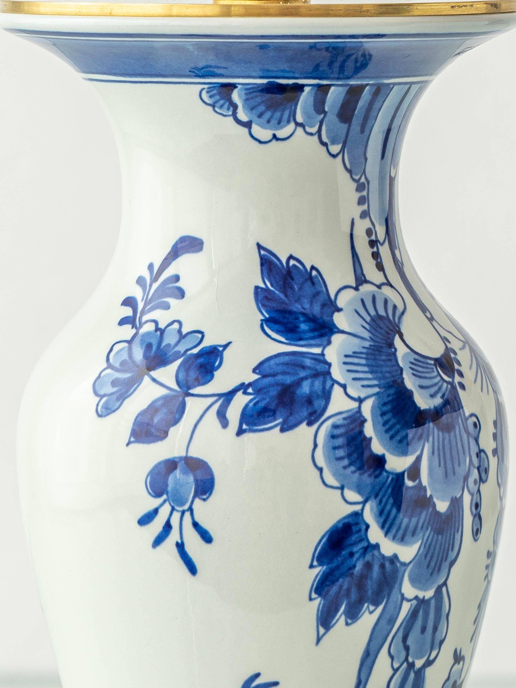 Pair of Chinese table lamps in Delft blue ceramic with new green silk shades.