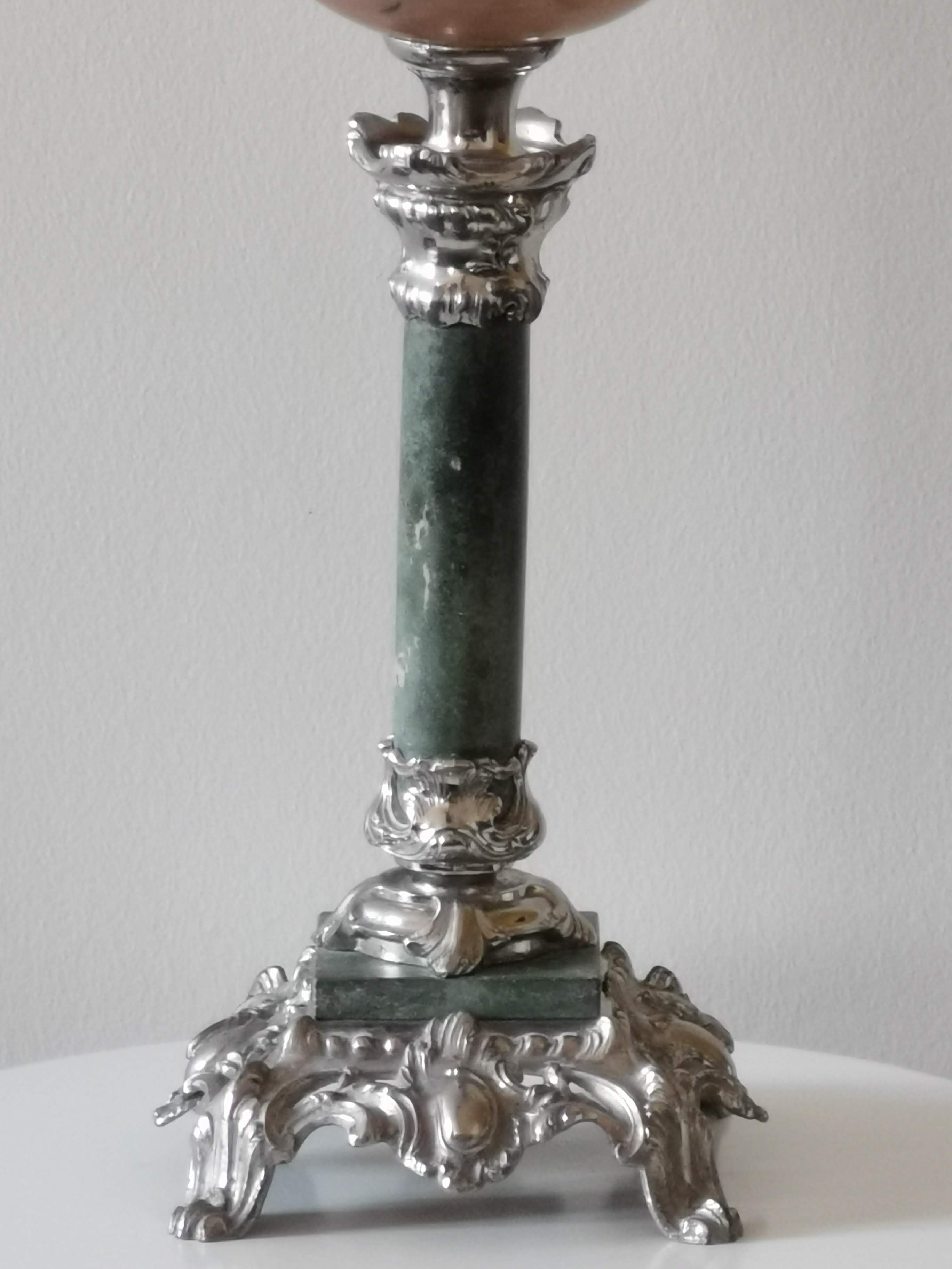 Kerosene lamp late nineteenth century mounted on Corinthian column.