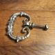 Old silver-plated metal furniture handle