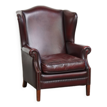 Fauteuil à oreilles en cuir de vachette rouge bordeaux de style anglais