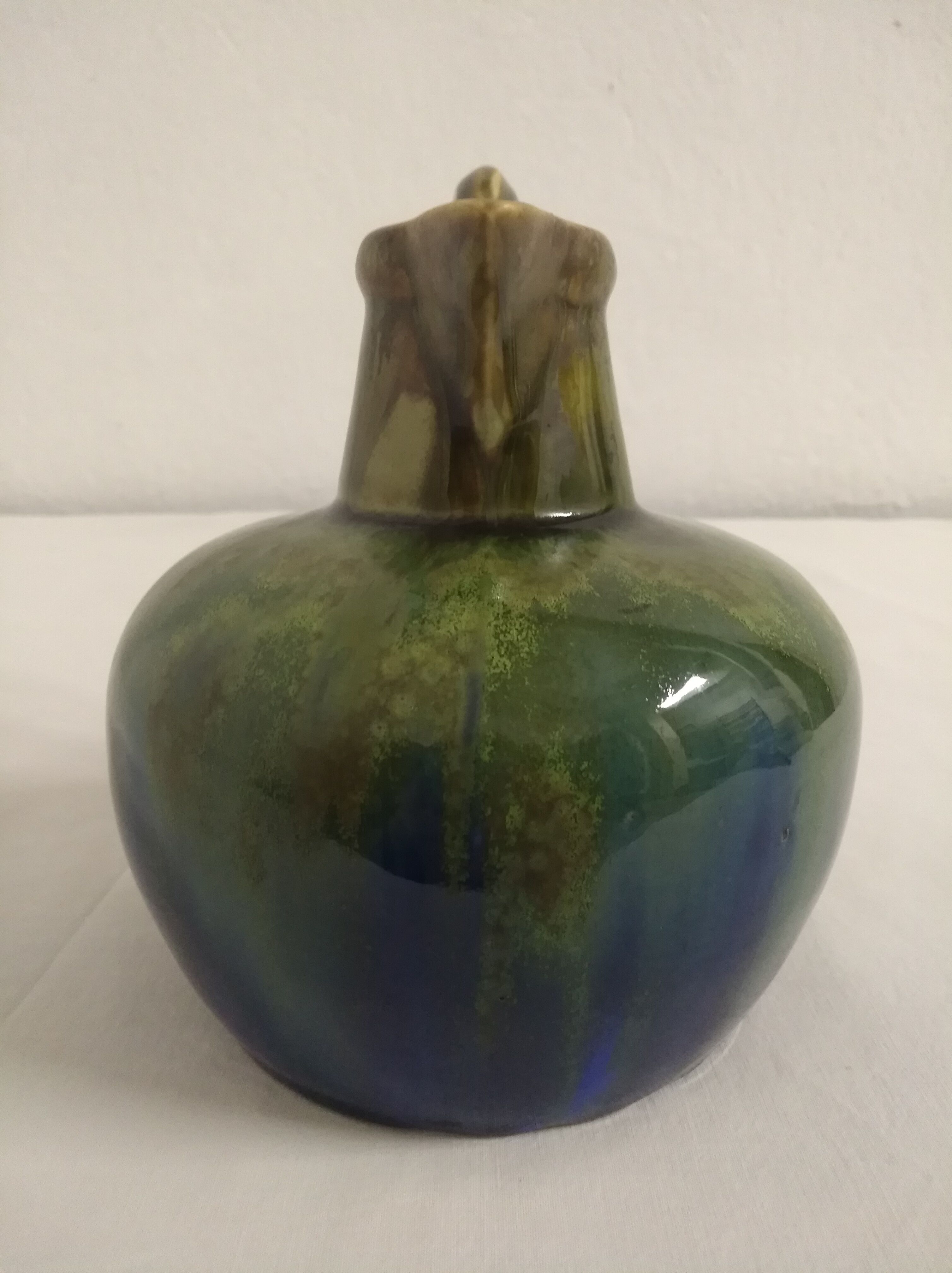 Flamed ceramic pitcher