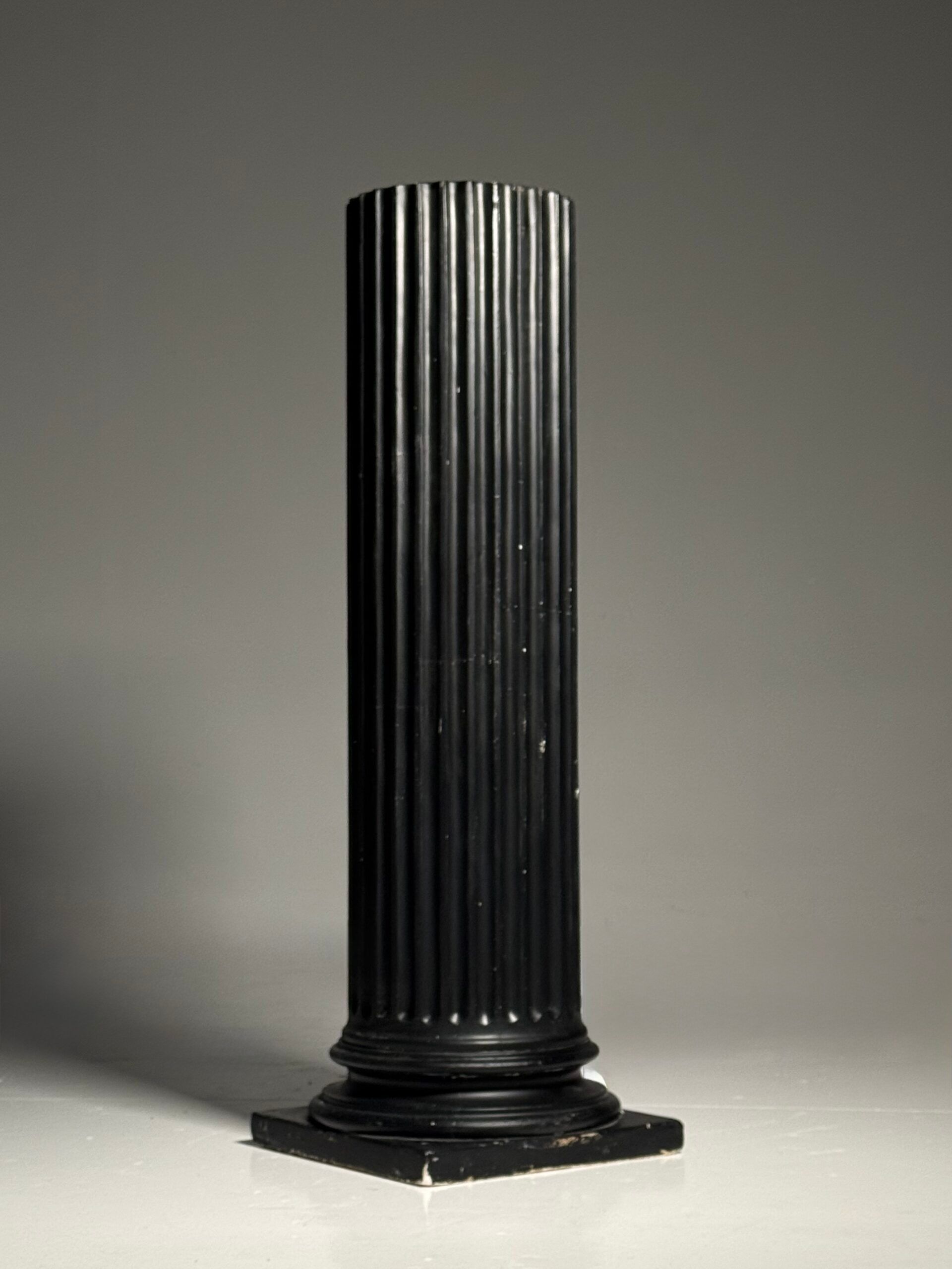 Neoclassical black plaster column