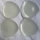 Set of 4 triangular dessert plates.