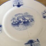 Series of 11 flat plates, Dutch earthenware, early XX