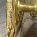 Three vintage brass candle holders