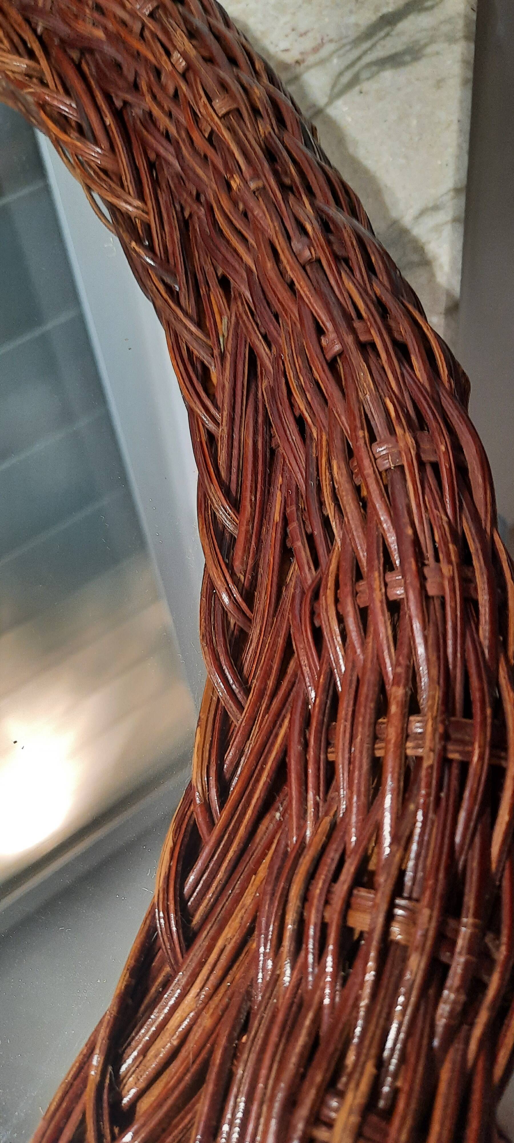 Vintage woven wicker oval mirror