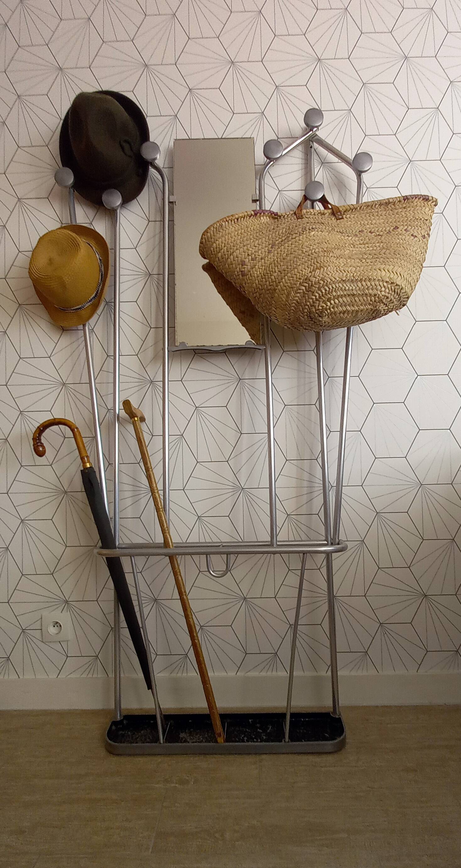 Vintage aluminum wall coat rack.