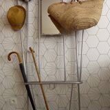 Vintage aluminum wall coat rack.