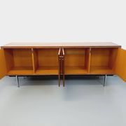 Vintage modernist enfilade in rosewood and chrome metal from the 60s and 70s.