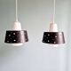 A pair of Scandinavian pendant lights in white opaline and black lacquered metal, 1960.