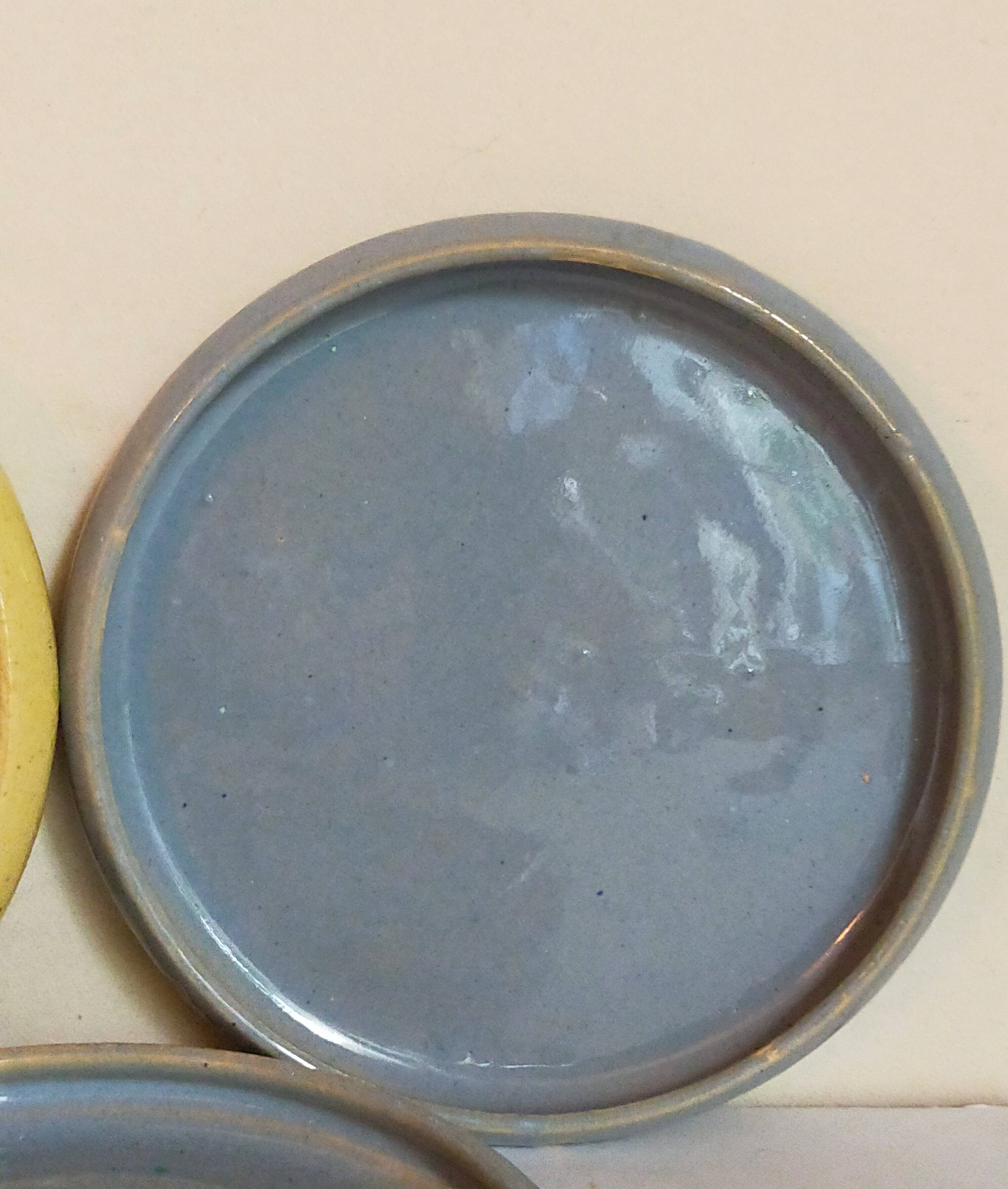Seven vintage potter's sweet treat plates