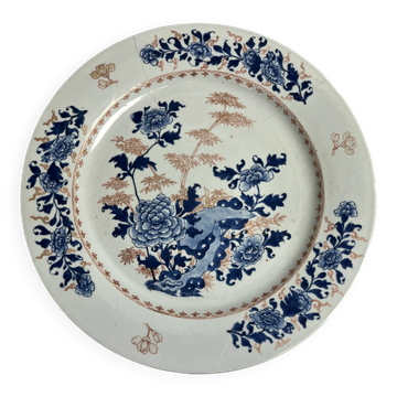 Japan, Imari porcelain plate with bamboo and peonies, 19th century.