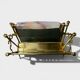 Exceptional magazine rack in brass, smoked glass and Onyx handle.