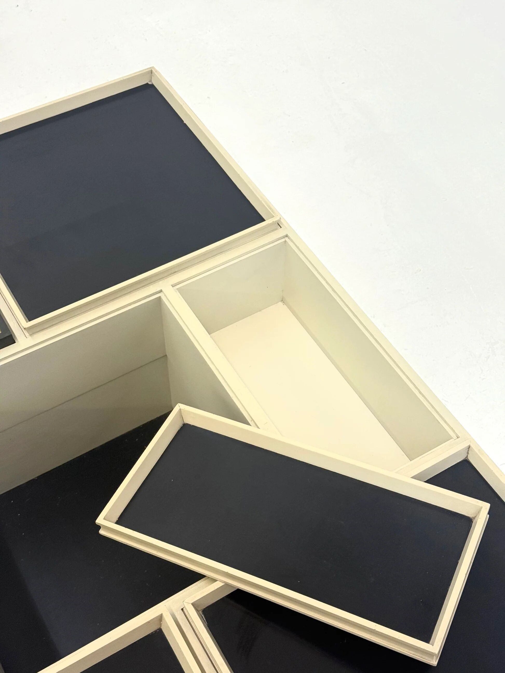 Modular white coffee table designed by Carlo Hauner for Forma