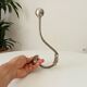Antique steel wall-mounted coat rack