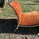 Chrome steel armchair and orange fabric by Vittorio Introini