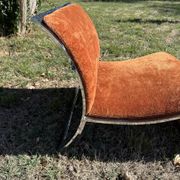 Chrome steel armchair and orange fabric by Vittorio Introini