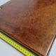 Underhand in saddle leather and vintage brushed metal