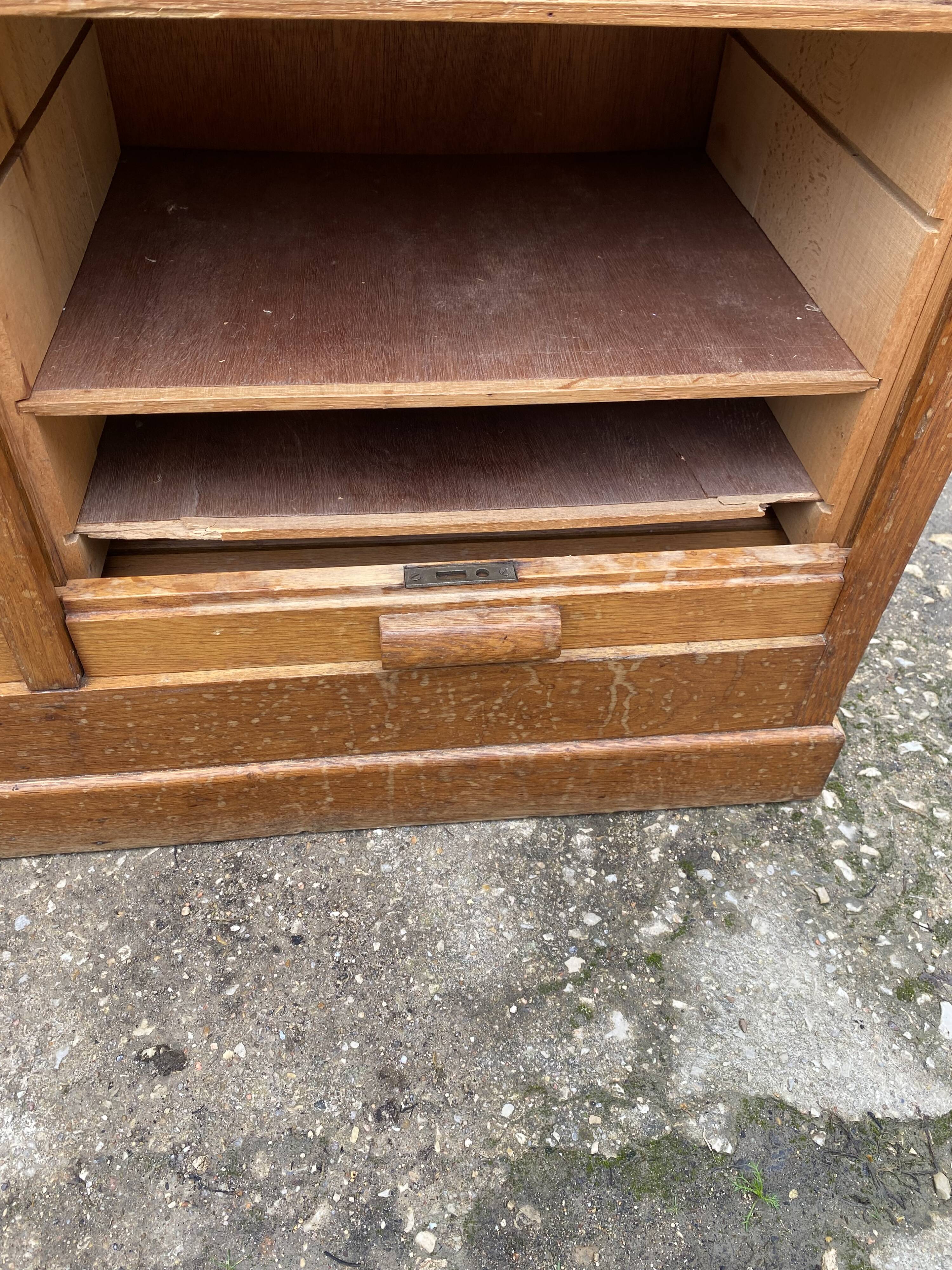 Double-column oak filing cabinet with curtains, 1950s.