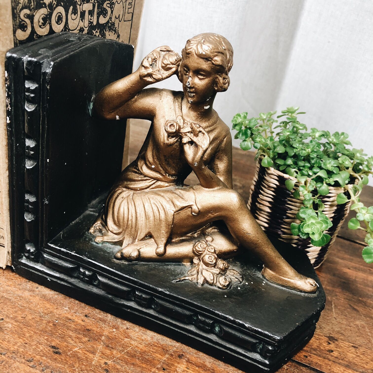 Old book clamps in black & gold plaster